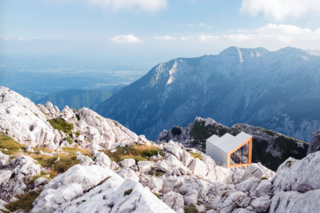 As the proposal from an architectural design studio at the Harvard Graduate School of Design, the Alpine Shelter Skuta Mountain sought to provide an innovative, yet practical, shelter for an extreme climate. The built proposal reflects the local vernacular architecture of Slovenia, with gabled roofs for shedding snow.