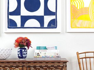 Framed art above a credenza Having your artwork framed makes it stand out so much more; Source: Simply Framed 