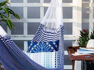 Cozy up with a good book in this comfy hammock; Source: Zola 