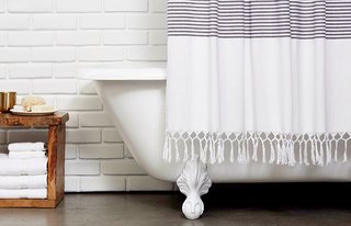 The Turkish Shower Curtain features a fetching, hand-knotted fringe hem; Source: Nicole LaMotte/Parachute 