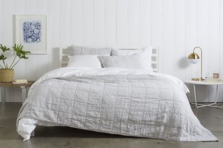 Complement your Bedding with home decor that matches the season. Plants and lighter furniture are great for spring and summer; Source: Nicole LaMotte/Parachute