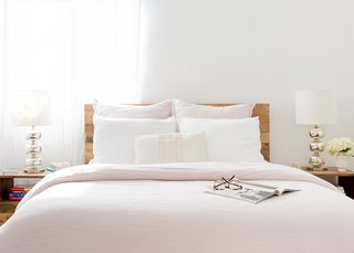 How to Design an Apartment You and Your Roommate Love - Photo 8 of 10 - Blush Linen Bedding: Parachute. Blush Linen Euro Shams: Parachute. White Linen Pillowcases: Parachute. Emerson Reclaimed Wood Nightstands: West Elm. Abacus Table Lamps: West Elm; Source: Amy Bartlam/Parachute