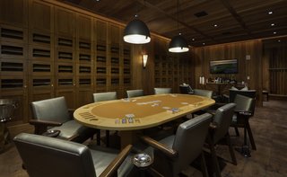 Kohanaiki Unveils One of the World's Largest Private Clubhouses on the Big Island of Hawaii - Photo 2 of 7 - Private cigar and card room hidden behind a secret door.