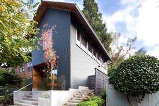 Taking its cues from the traditional homes in the neighborhood, this Portland, Oregon, ADU features a deep entry that faces the street and serves as a modern interpretation of a front porch.