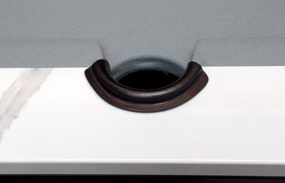 The combination of marble, leather and grey felt.
