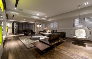 Natural Theme - Photo 1 of 17 - Open space such as the living room was mainly designed with earth tones, combining trend and personality. The open design of TV shelving is the best display case for the "agarwood" collection because one can enjoy the different characters of the "agarwood" from the hallway or living room as the viewing angles or the light change.
