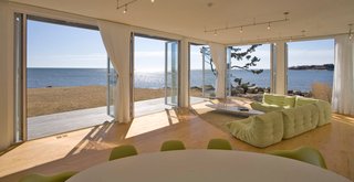 The architect’s ambition for this home was not simply to frame the view but to become one with the landscape. The NanaWall system achieved this in one elegant and dramatic gesture.