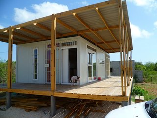 Bonaire, a former Netherlands Antilles territory and now a special municipality directly under the Netherlands, hosts this container property on 1,260 square meters of land. The property is has off-grid electricity via four solar panels on the roof. 