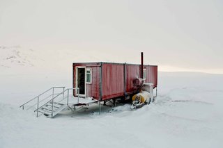 When it comes to demonstrating the hardiness of shipping containers as homes in harsh environments, it doesn't get any more incredible than this example captured by photographer Bryce Johnson in the bleak wilderness of Iceland.