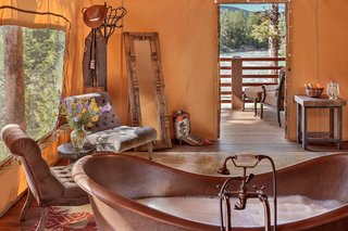 At this sprawling resort just east of Missoula, honeymooning couples can choose between six glamping tents, each fitted with a king bed, jetted tubs/showers, and luxury resort amenities. Honeymooners will definitely want to book the Tango Point tent. In addition to its prime location along the banks of the scenic Blackfoot River, the suite comes with heated slate floors, a dining pavilion with fireplace and lounge, plus your very own camping butler!