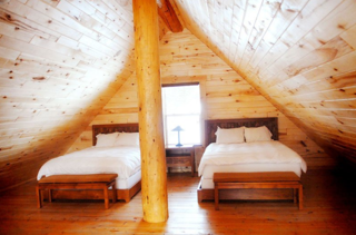 Enjoy a touch of luxury in these modern, cozy log cabins. Rustic at heart, each cabin houses either a one- or two-bedroom layout, a loft with two queen beds, fireplaces, stovetops, and spa-inspired bathrooms. Step outdoors and enjoy the surrounding Chalk Cliff views from your private deck or patio. All Cabins are a short walk to any of the natural hot spring pool areas and the Spa and Club at Mt. Princeton.