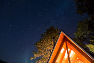 Perfectly located between Big Bear Lake and Lake Arrowhead, take in the gorgeous views from the big back deck. This charming and private A-frame cabin is the ideal escape.
