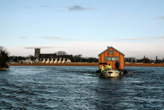 Upon delivery, Big Red was too big to fit through the narrow woodland track that provides access to Mudeford Spit, forcing Ecologic Developments to secure two ex-military pontoons that they use to float Big Red in down the river, bypassing the tight woodland. 