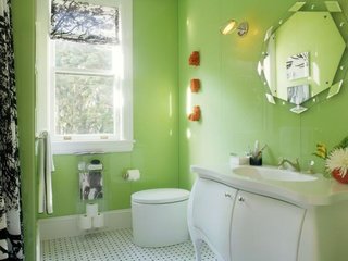 Apple green walls and an engaging floor pattern sparkle in this design by Steven Miller. 