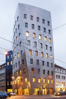 Constructed of stainless steel, the Gehry Tower is memorable for the noticeable twist in its outer façade on a ferroconcrete core, making optimal use of the relatively small piece of ground on which it is located. Like many of Gehry's buildings, the tower was created with the most modern technology available at the time.