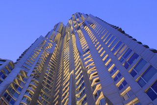 Gehry's building at 8 Spruce Street, New York, which features a rippling, undulating stainless steel facade, has become an iconic landmark that has captured both local and global attention and won critical acclaim.