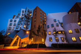 In a glowing appraisal of Gehry's Stata Center, Boston Globe architecture columnist Robert Campbell wrote: "The Stata is always going to look unfinished. It also looks as if it's about to collapse. Columns tilt at scary angles. Walls teeter, swerve, and collide in random curves and angles. Materials change wherever you look: brick, mirror-surface steel, brushed aluminum, brightly colored paint, corrugated metal. Everything looks improvised, as if thrown up at the last moment. That's the point." 