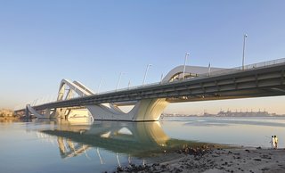 Conceived in an open setting, the Sheikh Zayed Bridge has the prospect of becoming a destination in itself and a potential catalyst in the future urban growth of Abu Dhabi. A collection—or strands of structures—gathered on one shore, are lifted and "propelled" over the length of the channel. A sinusoidal wave form provides the structural shape across the channel.