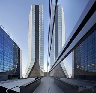 Hadid's "union of complexity and subtlety, daring and femininity in her works," appealed to CMA CGM Group. They commissioned her to design a new head office—a 147-meter-high tower and a 135-meter-long annex—to "represent CMA CGM Group's daring and initiative." The CMA CGM Tower is at once a symbol and a link between the port and the city of Marseille, anchoring the Group to its environment and its time.