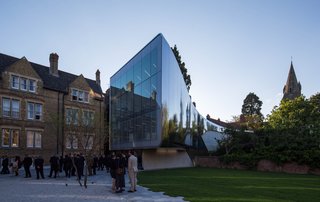 The Investcorp Building integrates new academic and research facilities within a design that's defined by the existing built and natural environment of the college. The project maintains the detached character of the college’s current buildings, allowing them to be read as separate elements, while introducing a contemporary building that conveys the past, present, and future evolution of the college, university, and city.