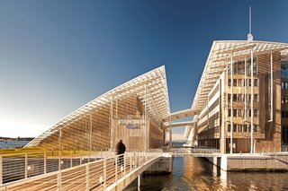 Designed to house the Astrup Fearnley Museum's permanent collection, this space also includes a separate space for its temporary exhibitions and an office building that has its own exhibition area for a private art collection. This strong, timber-clad shelter dwells under a single swooping glass roof in a newly landscaped public sculpture garden. 