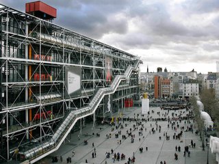 National Geographic described this design as "love at second sight." The Centre Georges Pompidou in Paris revolutionized museum design, showcasing a busy center for social activities and cultural exchanges. The building appears to be turned "inside out," revealing its inner workings. 