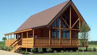 10 Prefab Log Home Companies - Photo 1 of 10 - Conestoga Log Cabins was originally established to construct simple, solid, and economical structures for the campground market. Families soon discovered the warmth and coziness of their cabins and asked to buy their own..
