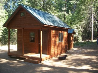 10 Prefab Log Home Companies - Photo 3 of 10 - These tiny homes are ideal for easy assembly and can be transported to remote locations or your backyard. No section is larger than four feet wide or 12 feet long. Everything is either pre-assembled in sections or pre-cut for hassle-free construction. Staining and painting options are also available.