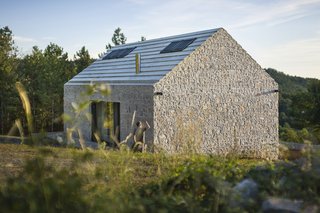These 4 Modern Homes Around the World Take Advantage of Local Stone - Photo 5 of 16 - Compact Karst House by dekleva gregorič arhitekti