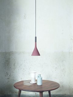 Shown here is Foscarini's Aplomb fixture in red brick.