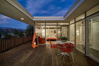 A Midcentury-Modern Home in L.A. Designed by Richard Banta Is For Sale For $899K - Photo 3 of 13 - The bedrooms are located on one wing of the H-shaped house, with the kitchen, dining, and living area on the other.