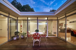 A Midcentury-Modern Home in L.A. Designed by Richard Banta Is For Sale For $899K - Photo 4 of 13 - The patio is open to the sky above, allowing light to flood the rooms that surround it.