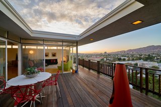 A Midcentury-Modern Home in L.A. Designed by Richard Banta Is For Sale For $899K - Photo 8 of 13 - The outdoor terrace extends along the living room, allowing for panoramic views of the city.