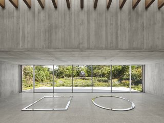 Celebrate Compact and Low-Budget Design With the the AIA Small Project Awards - Photo 2 of 7 - Another 2017 winner was the De Maria Pavilion in Bridgehampton, New York, by Gluckman Tang Architects. The concrete art pavilion is located along an art walk on a grand estate.