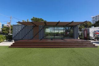 Based in Wynwood, Florida, Wyn-Box constructed their model container home out of two used cargo containers. The 640-square-foot, one-bedroom showroom was designed by architects Ruslanas Byckovas and Ethan Royal with Ryan Anderson, a business developer, and boasts a stainless-steel kitchen, porcelain gray tile, and a modern, clean gray exterior.