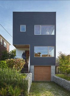 As Seattle's first LEED Platinum Modular Home, Lane Street was completed by Hybrid Architecture and Greenfab with a focus on energy reduction through a combination of eco-friendly exterior materials and energy-conscious heating and cooling equipment, including a hybrid heat-pump water heater and energy recovery ventilation. The 1,870-square-foot home consists of three bedrooms, and was completed for an all-in cost of $405,000 in 2010.