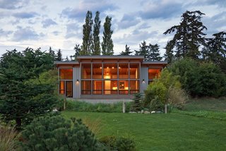 In a small community with a shared garden, FabCab built this prefab home, which integrates high-quality materials to keep the dwelling from feeling clinical, despite its construction in a factory. The architects also incorporated universal design features to make the homes both appropriate and comfortable for aging clients. 