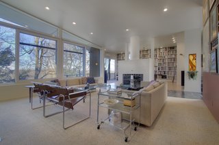 Light pours in through the large glass panes, which are operable clerestory windows to allow for passive ventilation.