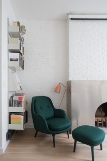 White shelving blends in seamlessly with the crisp, white walls. 