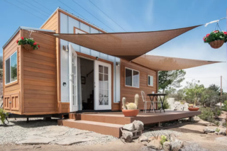Located in sunny Southern California, The Zen Cottages offers three different models—as well as custom-built tiny homes—that are typically between 16 to 32 feet long and between 8 to 10 feet wide. Although the larger homes aren't ideal for transporting, the smaller Alpine model is built for long hauls and can even travel through rocky terrain. The interiors are light-filled, simple, and efficient, with careful attention to natural materials.