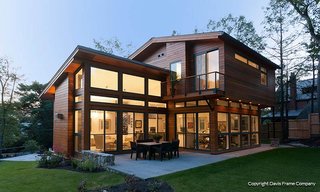 Davis Frame Company originally started out building high-quality, custom-designed timber frame homes. Yet as of 2007, the firm has expanded with prefabricated panelized properties. With their headquarters and manufacturing facility in Claremont, they pride themselves on delivering the highest quality possible in all aspects of design. Their packages not only include the structural framing, but also windows, doors, and exterior finishes such as siding, roofing, and trim. Their prefab walls speed up construction on-site and drastically minimize waste.