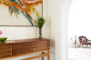 A glimpse from the entry hallway into the living room.