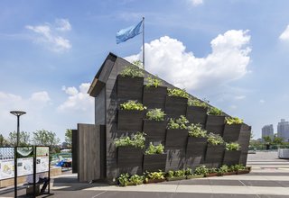 The tiny home was oriented to best take advantage of the sun, and an entire facade of the building was designed to hold greenery.