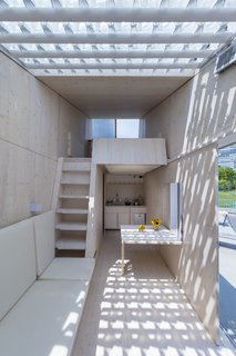 Interior wall cladding was installed by hand after arrival on site.