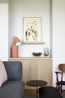 Simple shapes, subdued colors, and natural textures from wood and marble can be found throughout the hotel.