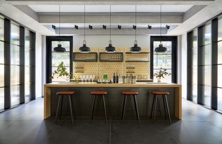 A workshop area in the hotel provides a spacious bar and sitting area for guests to work.