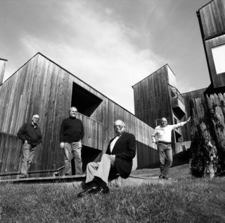 Architects Richard Whitaker, Donlyn Lyndon, Charles Moore, and William Turnbull—the designers of some of the earliest buildings at Sea Ranch—in Condominium #1 courtyard in 1991. 