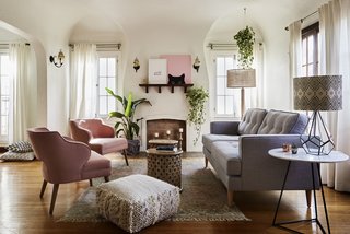 At a project in Los Angeles, AphroChic used warm pinks and grays, along with lots of greenery, to bring the outdoors in and make this Mission-style home classic and yet up-to-date.