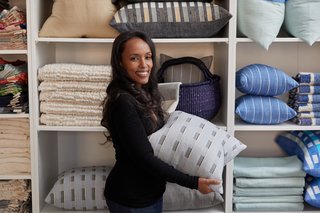After a high-powered career in interior design and architecture, founder and designer Hana Getachew sought to merge her love of the traditional Ethiopian textiles she had grown up with with her career in interior design. 
