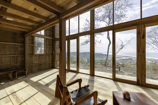 The floors, structure, window frames, and walls are all made of wood.
